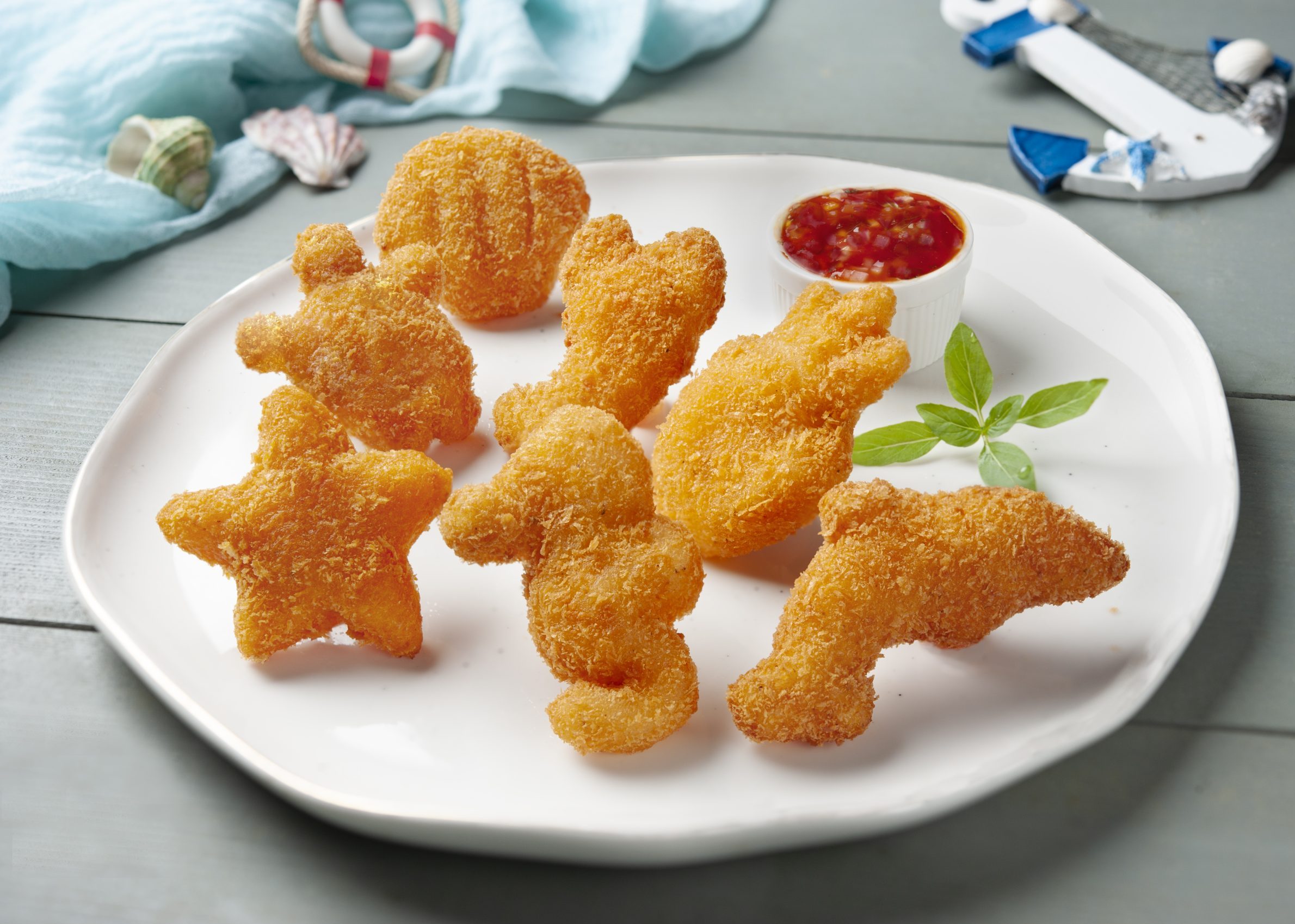 Breaded pangasius in seafood forms